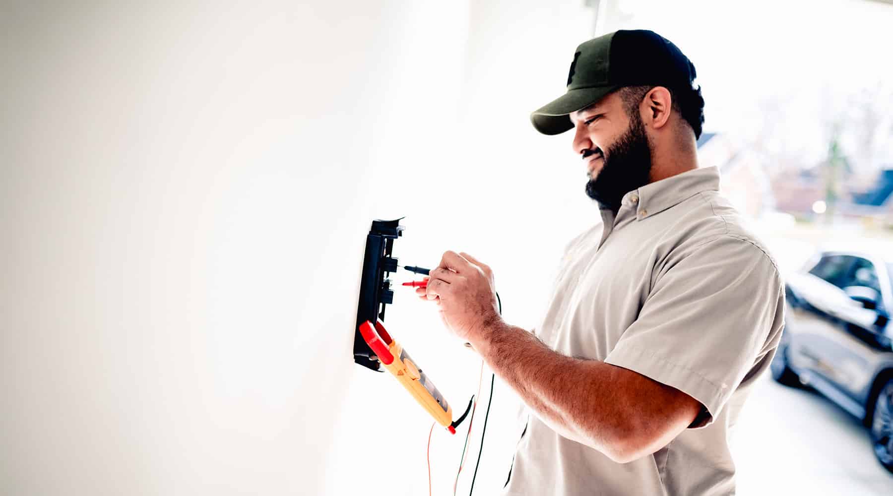 electrician testing ev charger