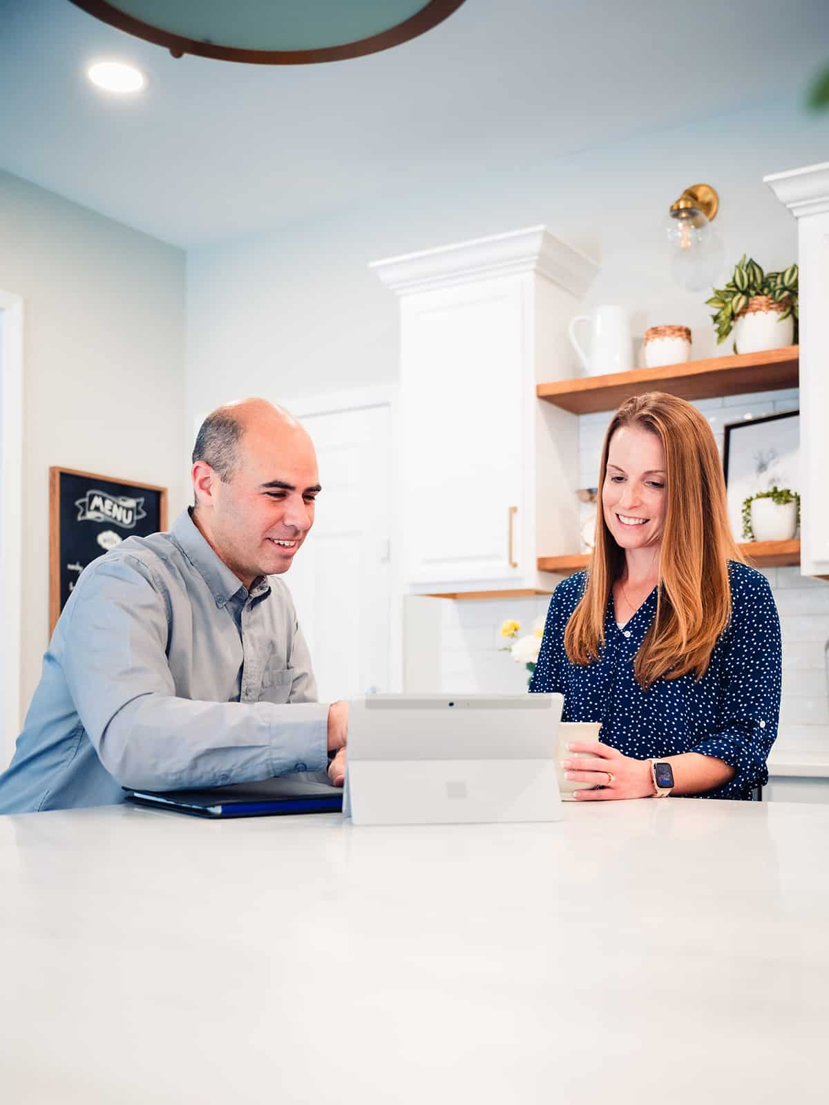 Bee Bright's electrician is reviewing different options with the homeowner